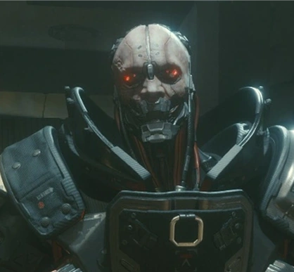 Een dreigende humanoïde robot in harnas met gloeiende rode ogen, staande in een slecht verlichte kamer. Het gezicht van de robot heeft een skeletachtig uiterlijk, wat een futuristische en intimiderende indruk wekt